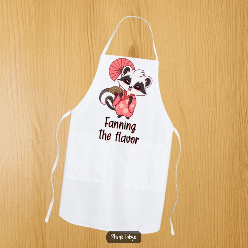 Funny kitchen apron with a skunk in a kimono playfully waving a large fan, adding festive humor to cooking.