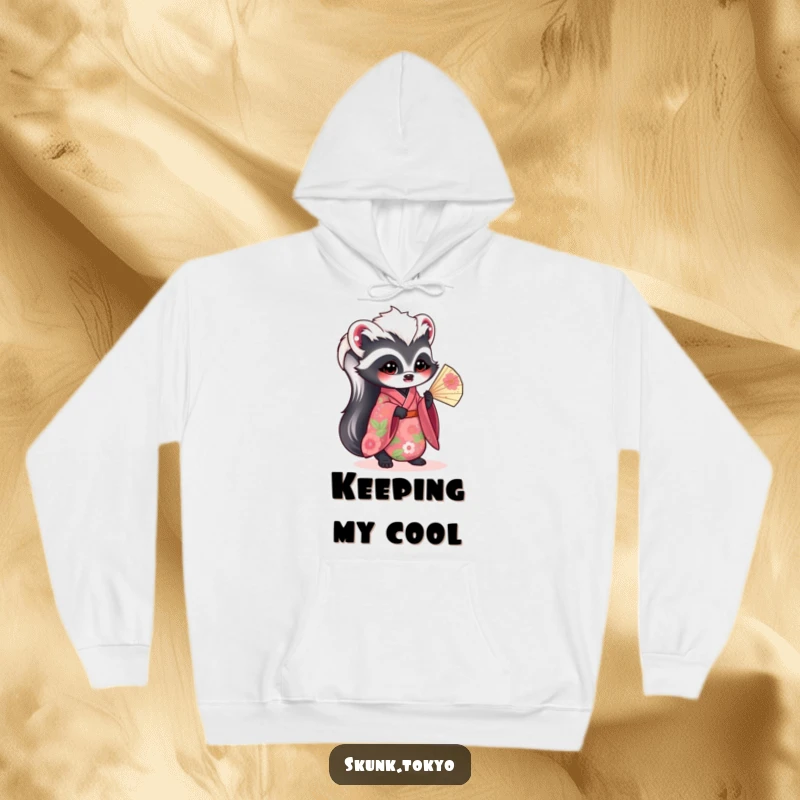 Funny kawaii skunk hoodie, draped in a vibrant floral kimono and holding a fan, a warm and humorous fashion choice.