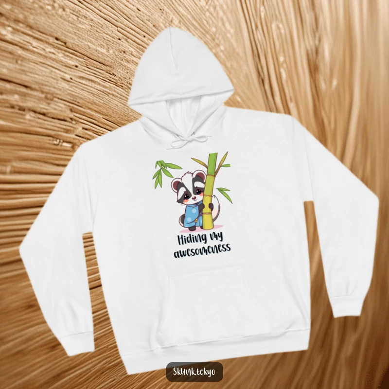 Funny kawaii skunk hoodie, wearing a blue kimono, playfully peeking from behind bamboo, a warm and humorous fashion statement.
