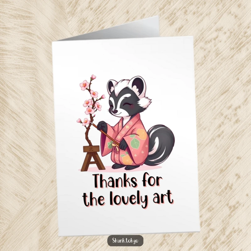 Funny Free Printable Thank You Card: A skunk in a stunning kimono painting a delicate cherry blossom branch with artistic flair.