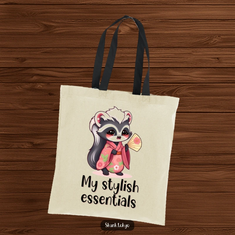 Funny kawaii skunk tote bag, adorned in a vibrant floral kimono and holding a fan, a stylish and humorous accessory.